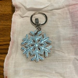 Metallic blue Coach keychain